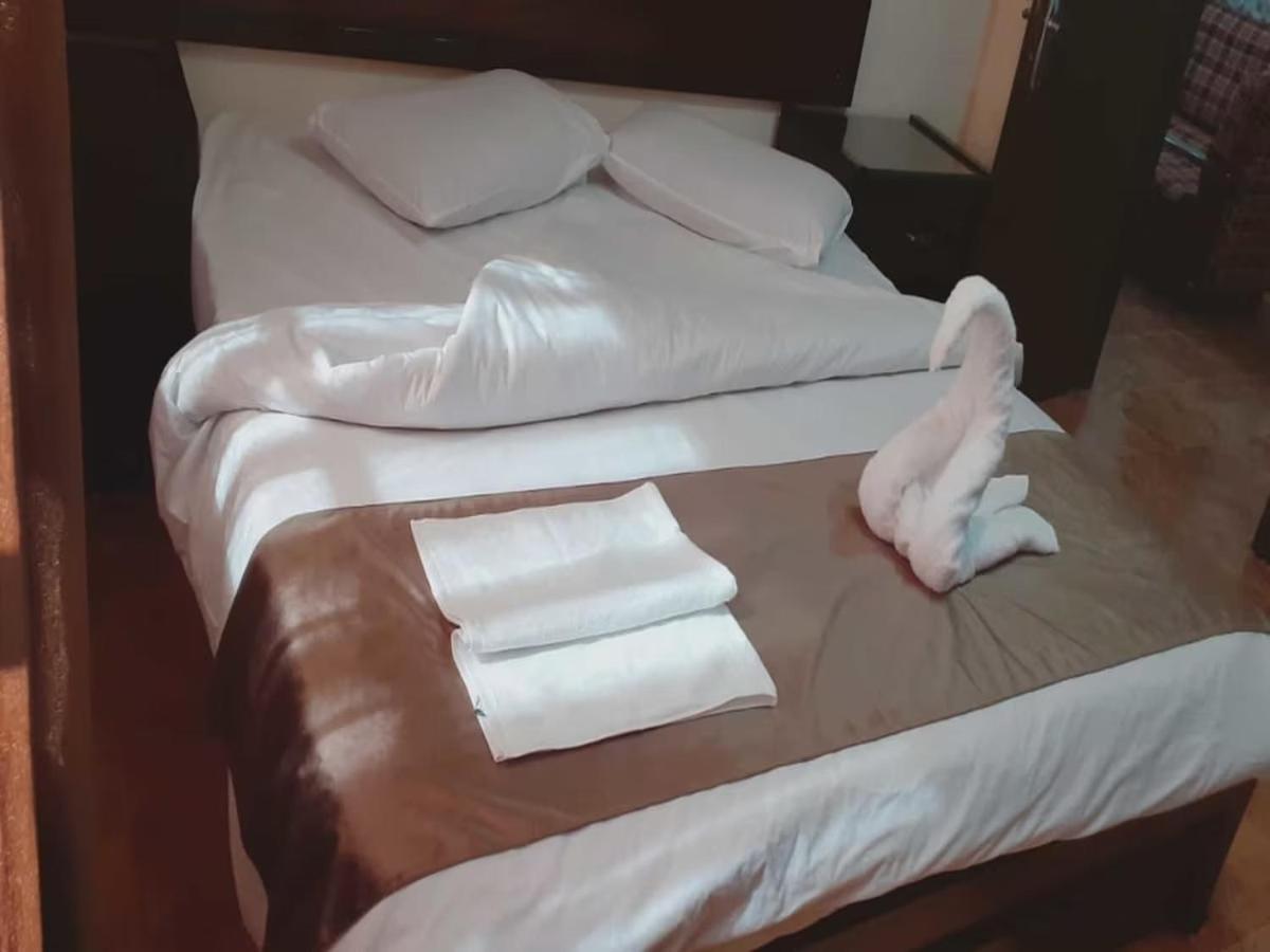 Al-Nujoom Hotel Suites Ammán Kültér fotó